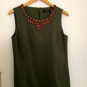 Green Ellen Tracy dress with orange stones.